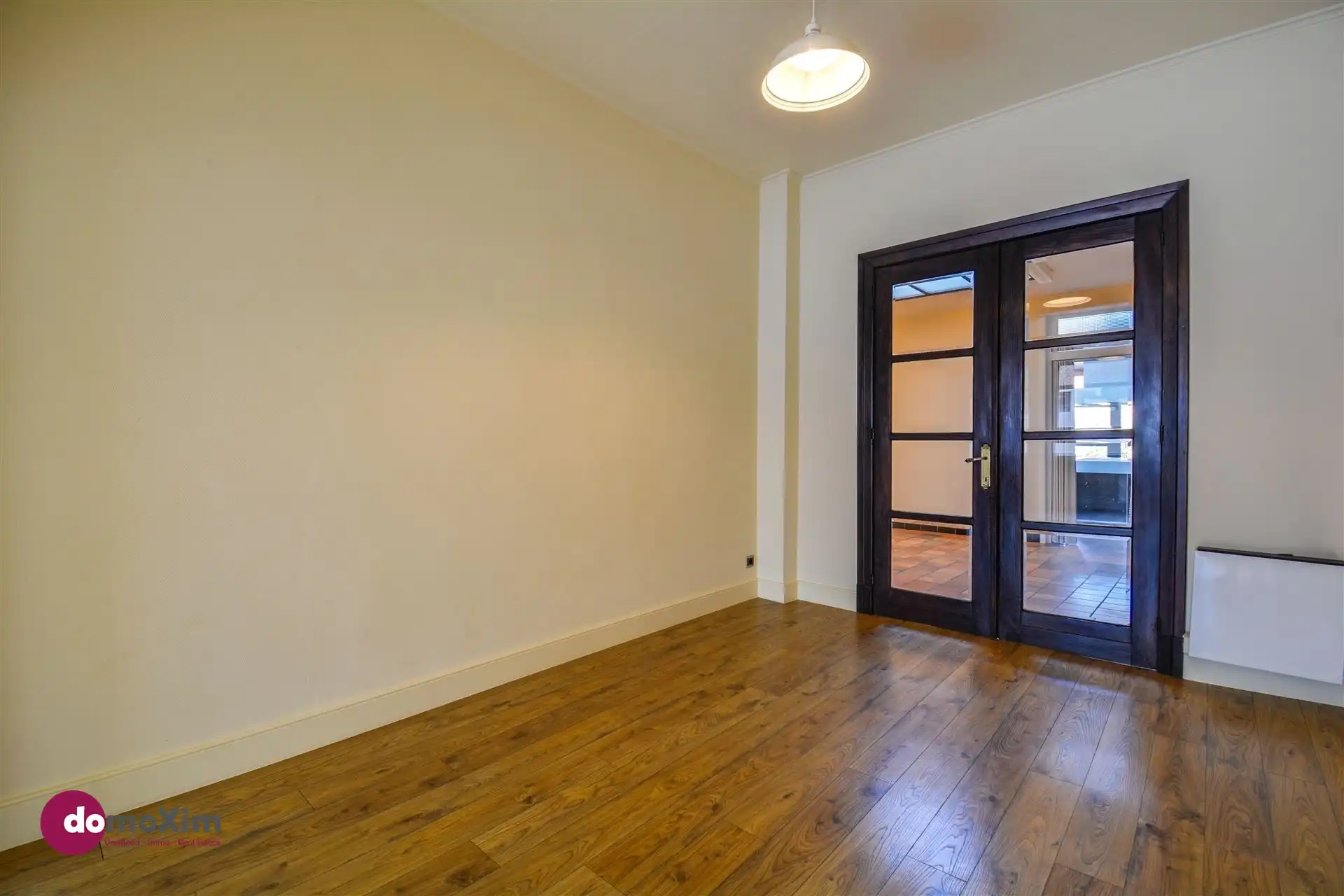 Ruime, karaktervolle stadswoning met twee garageboxen en tuin in Mechelen foto 5