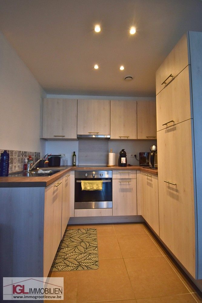 Recente 1 kamer appartement met terras en staanplaats. foto 5