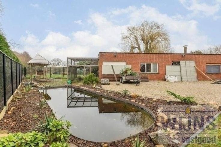 Veelzijdig renovatieproject met enorm potentieel op gunstige ligging foto 6