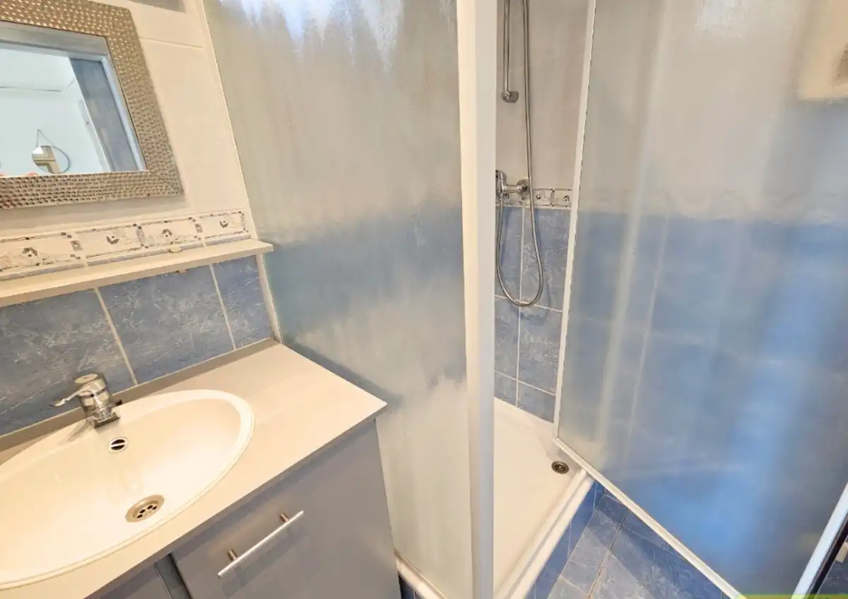 GERENOVEERD APPARTEMENT MET ZIJDELINGS ZEEZICHT TE KOOP IN DE PANNE foto 10