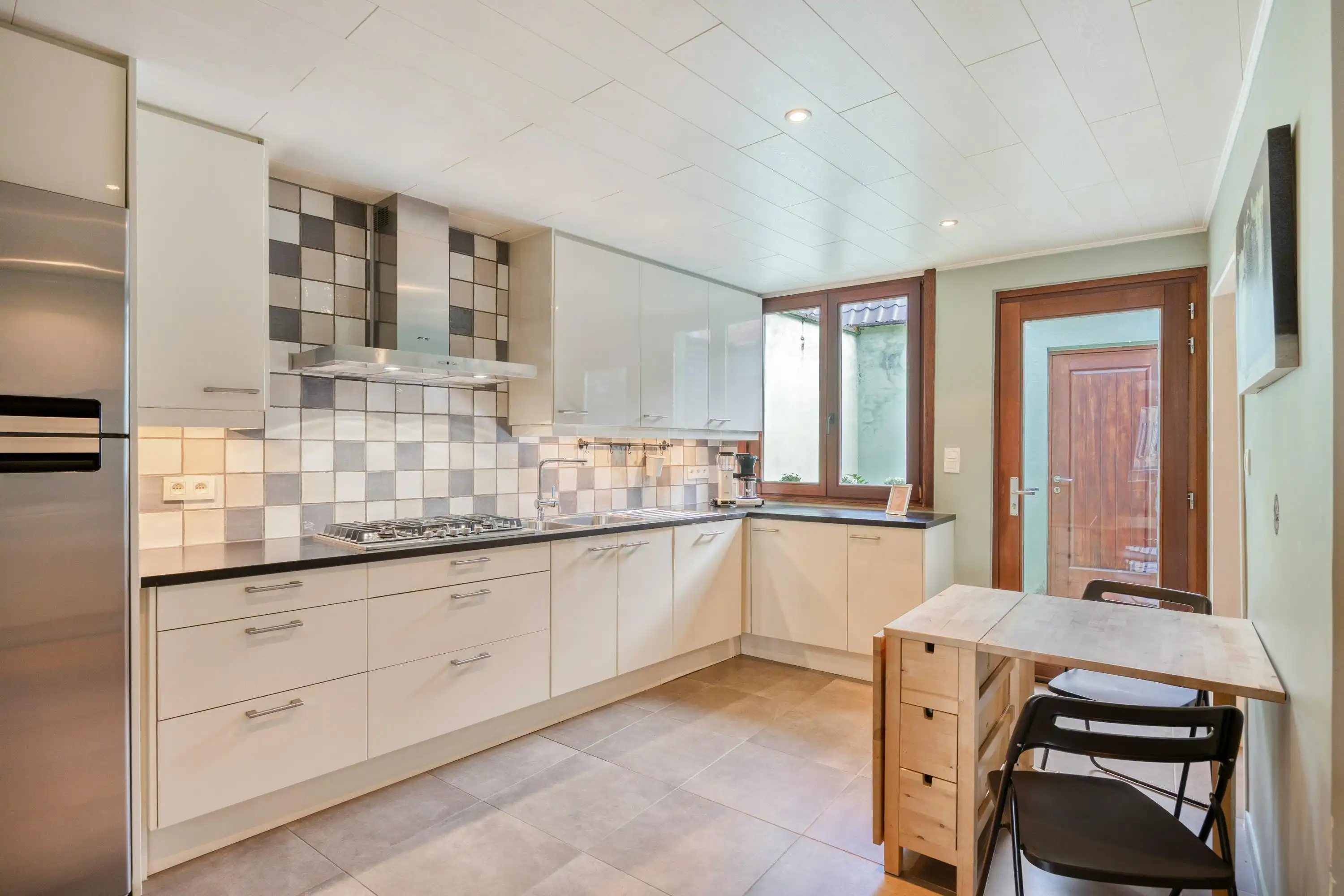 Gerenoveerd huis te koop in het centrum van Kruibeke foto 8