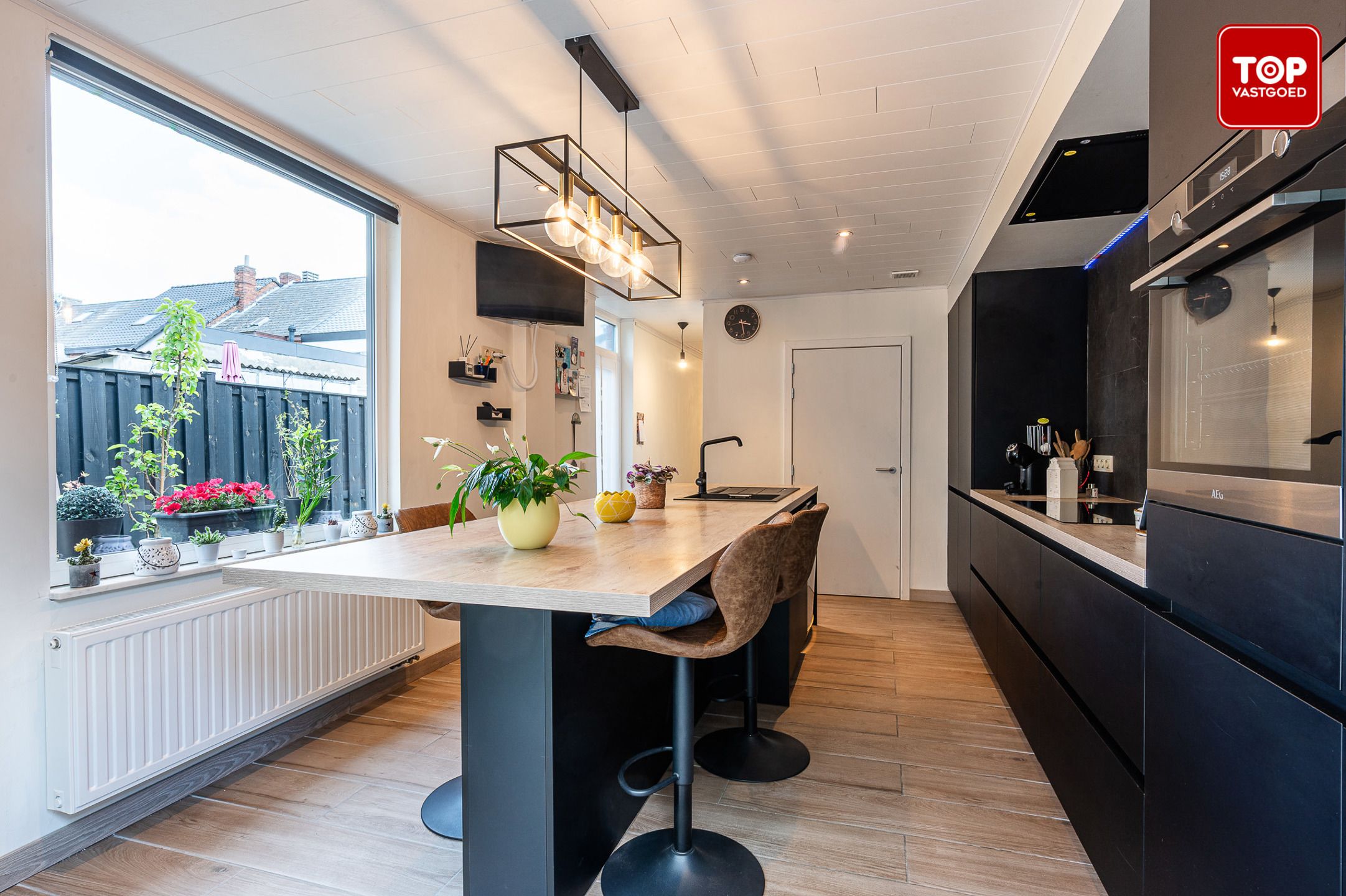 Charmante gezinswoning met tuin in hartje Wetteren foto 15