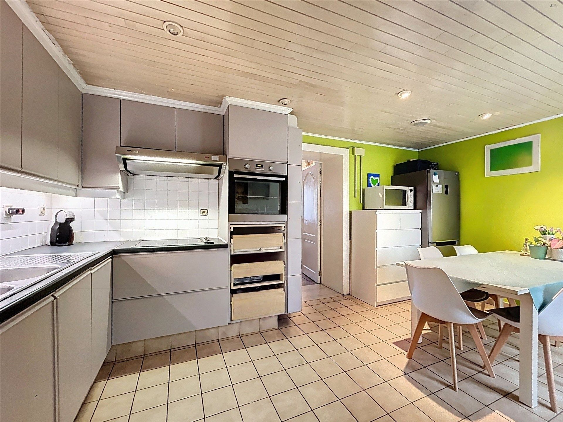 instapklare gezinswoning met 3 slaapkamers en half open karakter op perceel van 140m²  foto 4