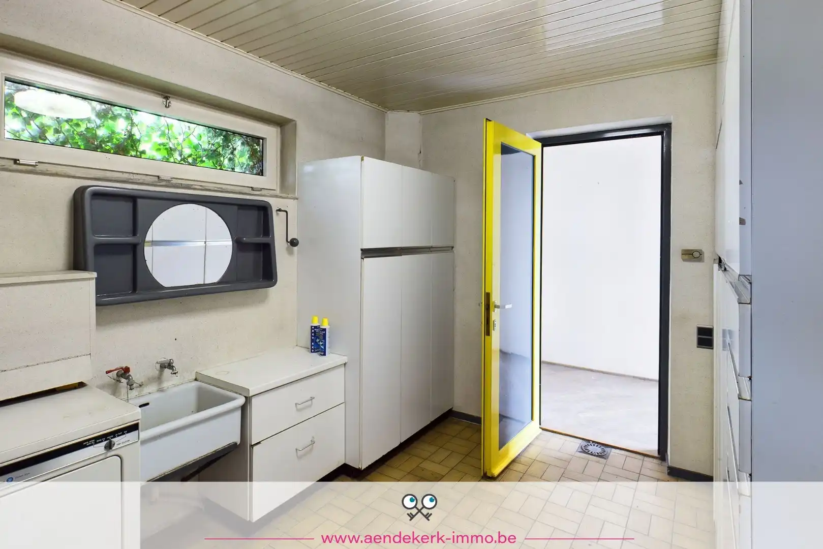 Woning met handelsruimte in het centrum van Kinrooi foto 19