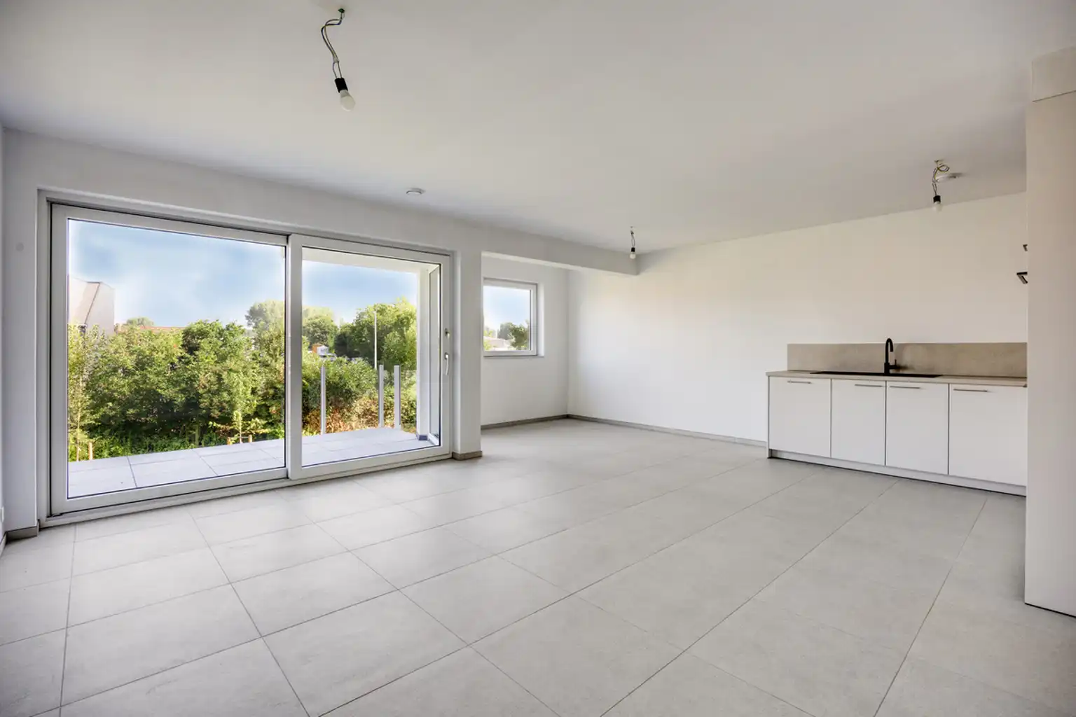 Energiezuinig nieuwbouwappartement met 2 slaapkamers en tuin foto {{pictureIndex}}