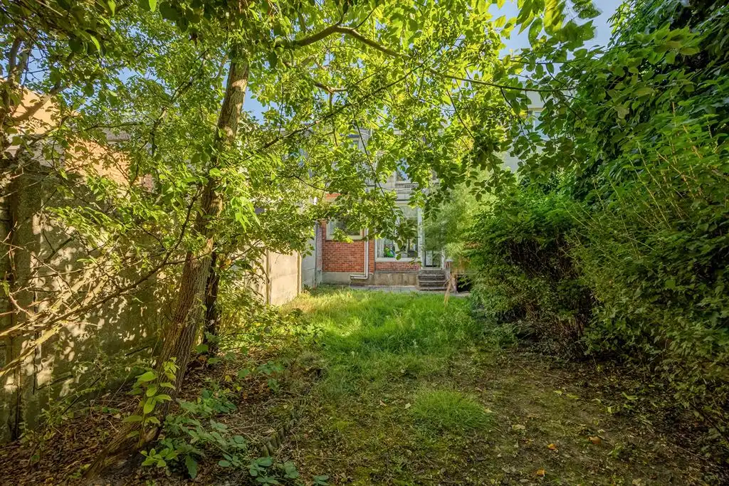 Op te frissen gezinswoning met tuin in Groenenhoek foto 9