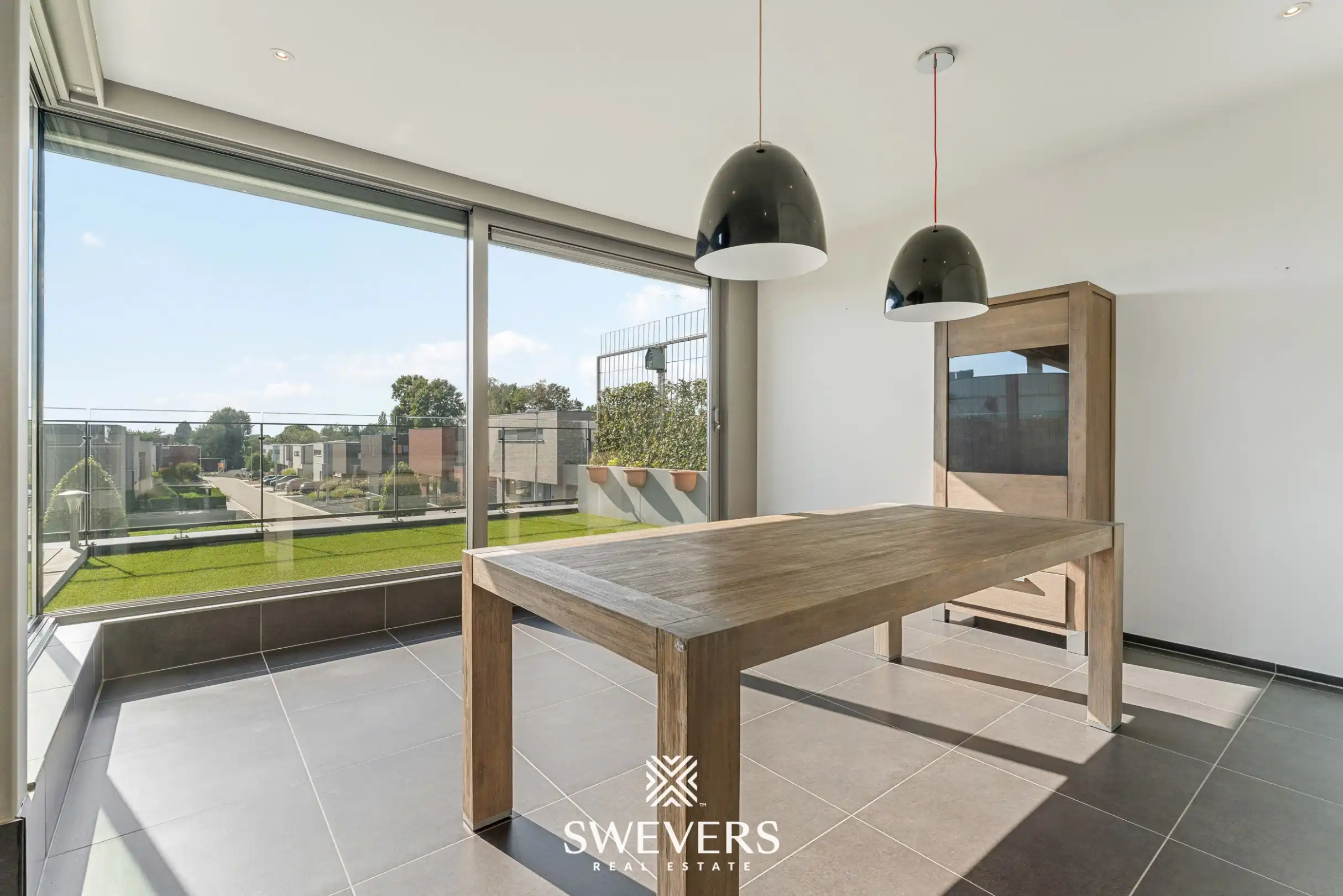 Instapklaar appartement met ruim terras en twee autostaanplaatsen in doodlopende straat foto 7