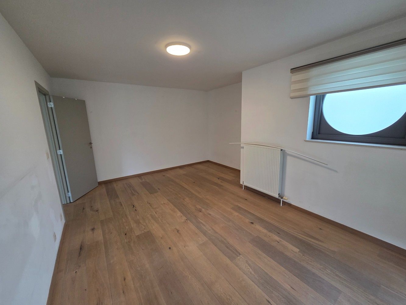 Clusterwoning met 4 ruime slaapkamers, tuin en 2 ondergrondse staanplaatsen. foto 18