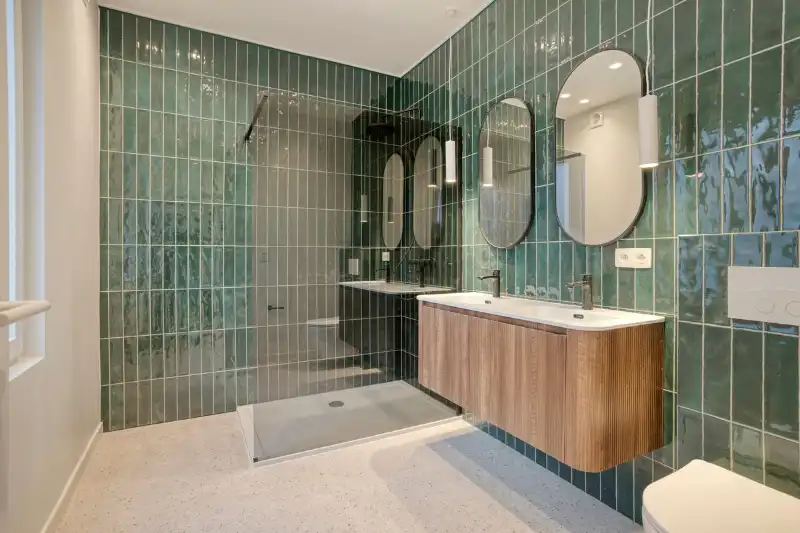 Verscholen achter een charmante groene gevel: prachtig gerenoveerde woning met 3 slaapkamers foto 7