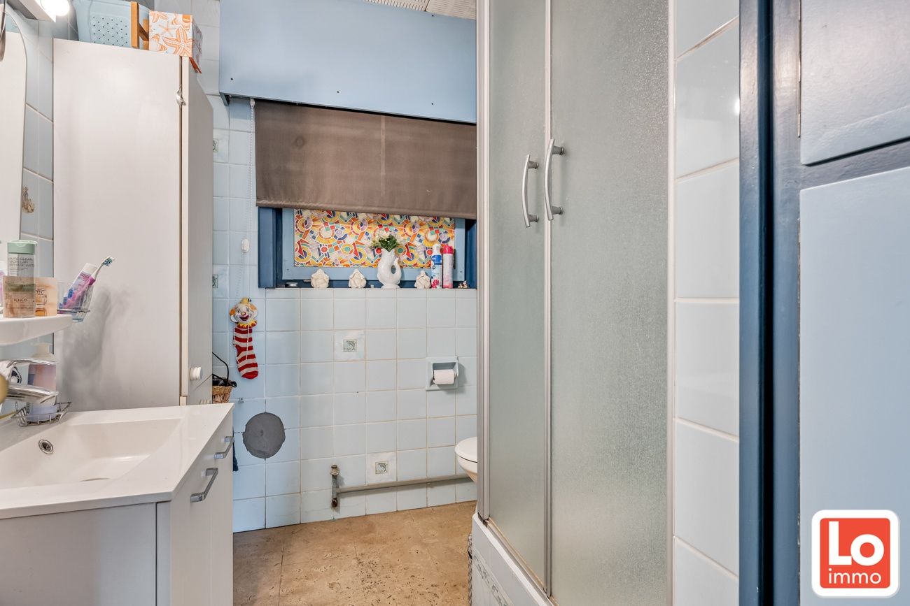 Te renoveren gelijkvloers woning met een open zicht op de achterliggende velden. foto 11