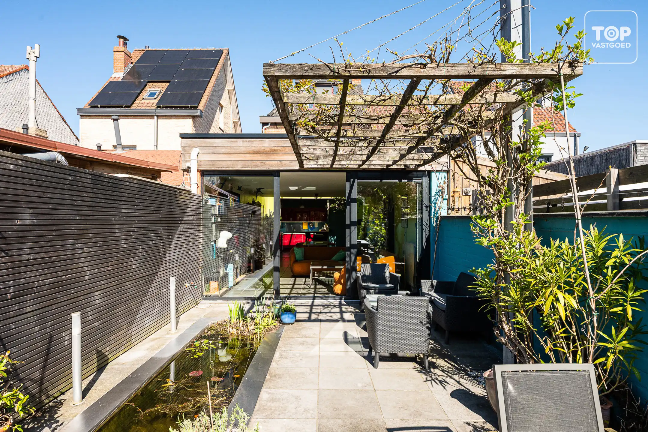 Instapklare woning met 4 slaapkamers, garage en prachtige tuin.  foto 14