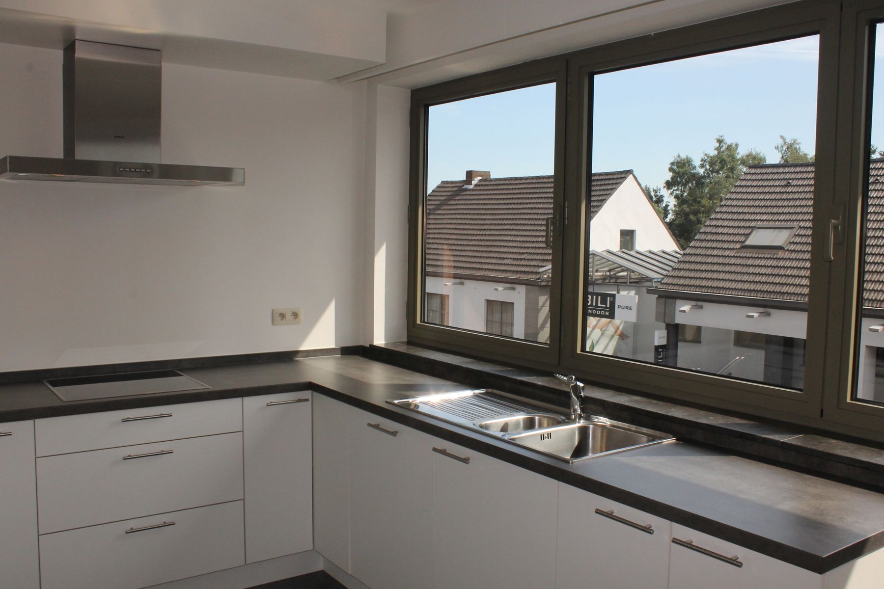 Een appartement met 2 slaapkamers, terras en autostaanplaats in het centrum van Merksplas. foto 7