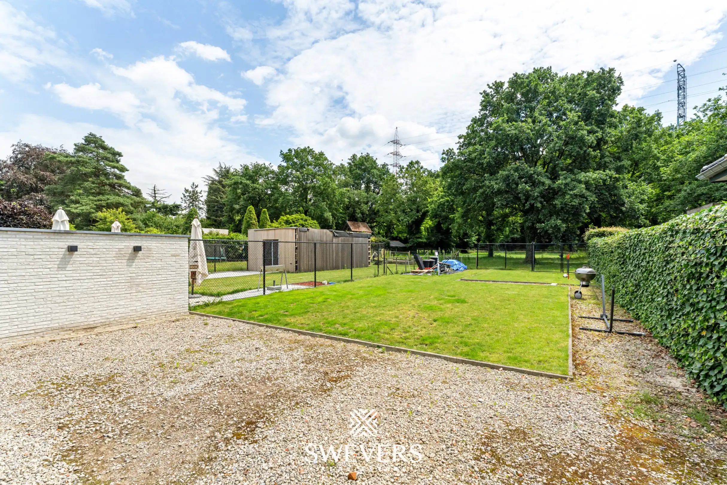 Recente halfopen bebouwing met 5 slaapkamers met verrassend grote tuin in Houthalen foto 22