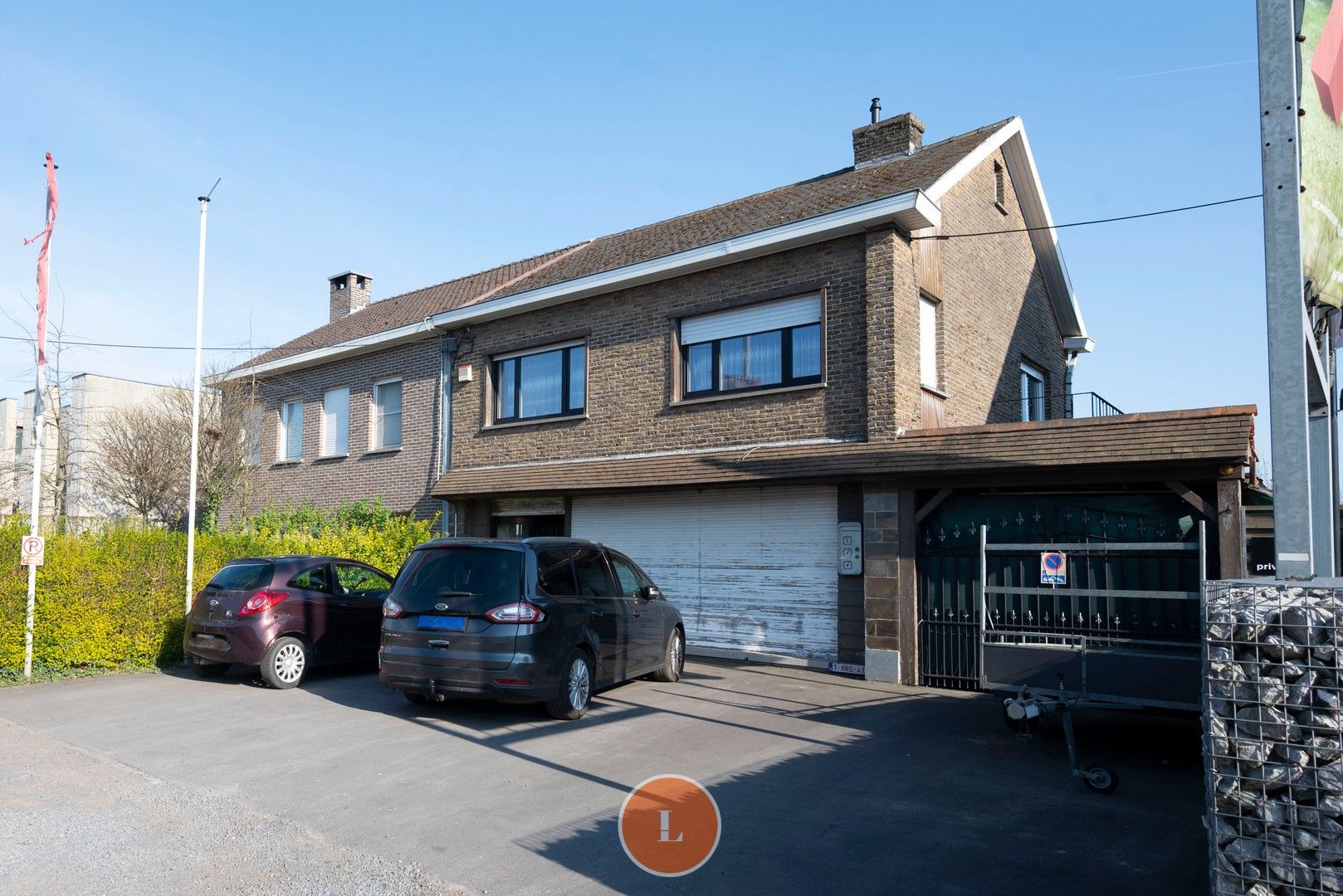 Ruim handelspand met woonst te koop in Beveren-Leie foto 2