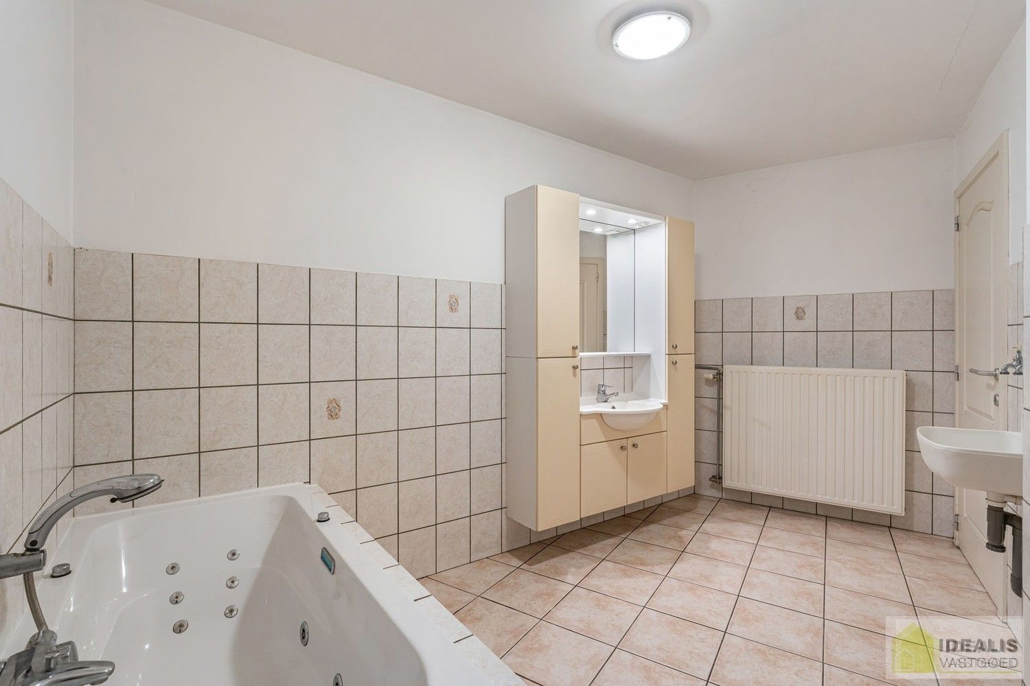 IDEALIS VASTGOED – INSTAPKLAAR GELIJKVLOERS APPARTEMENT MET LICHTRIJKE LEEFRUIMTE,  RUIME OPEN KEUKEN, BADKAMER, SLAAPKAMER EN AUTOSTAANPLAATS OP EEN GUNSTIGE LOCATIE NABIJ HET CENTRUM VAN PELT! foto 14