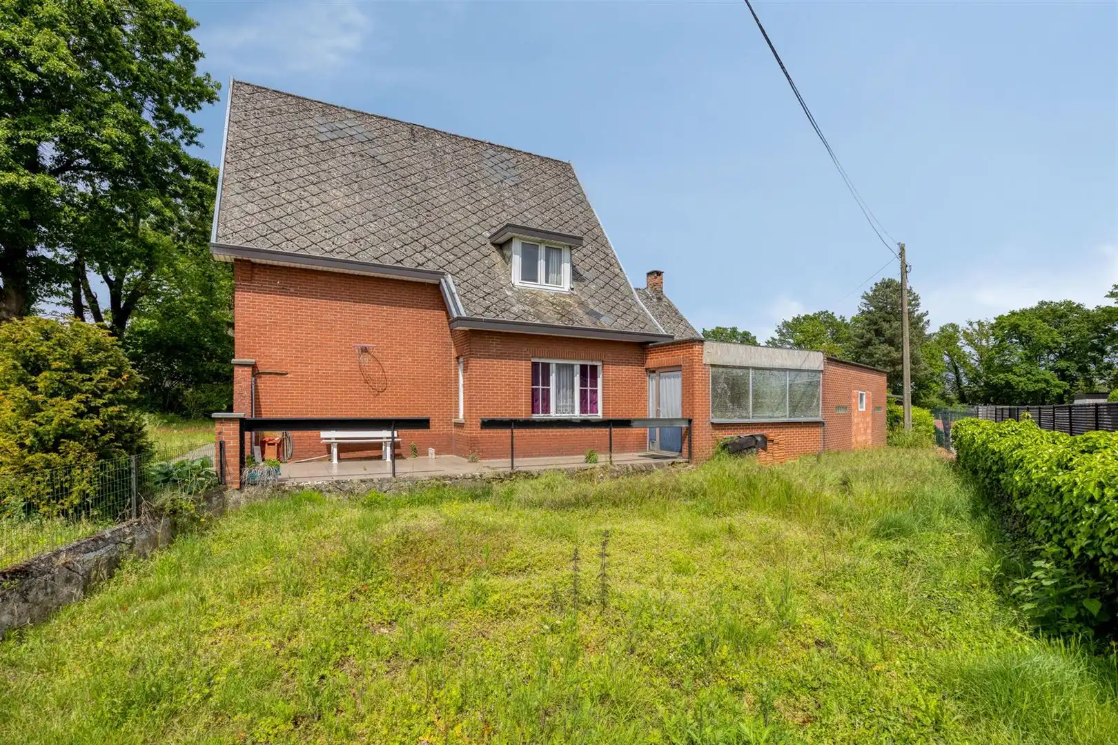 TE KOOP: Te renoveren woning met ruim perceel en projectmogelijkheden in Lummen! foto 23