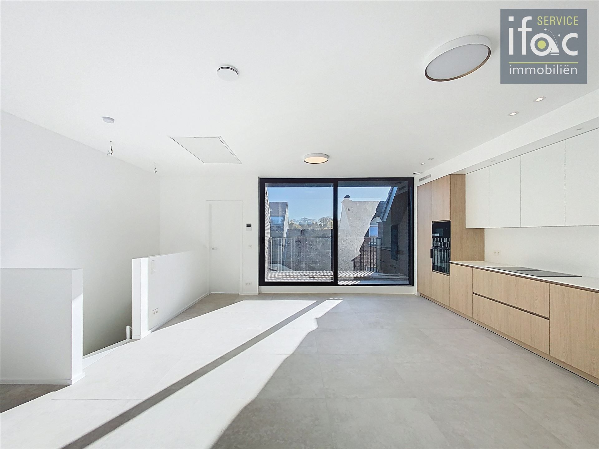 Nieuwbouwappartement met 3 slaapkamers foto {{pictureIndex}}