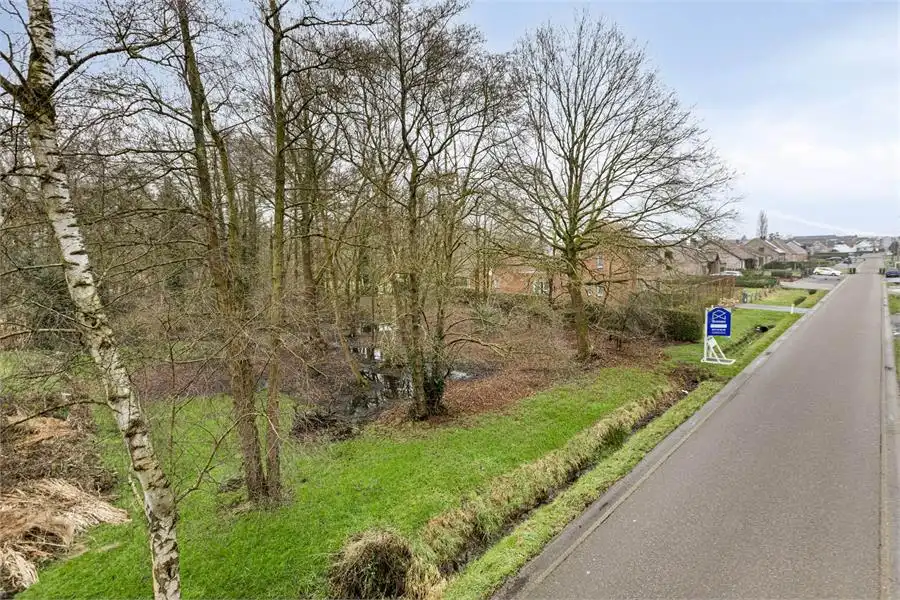 Bouwgrond te koop in Tessenderlo-Ham op perceel van 16a 76ca foto {{pictureIndex}}