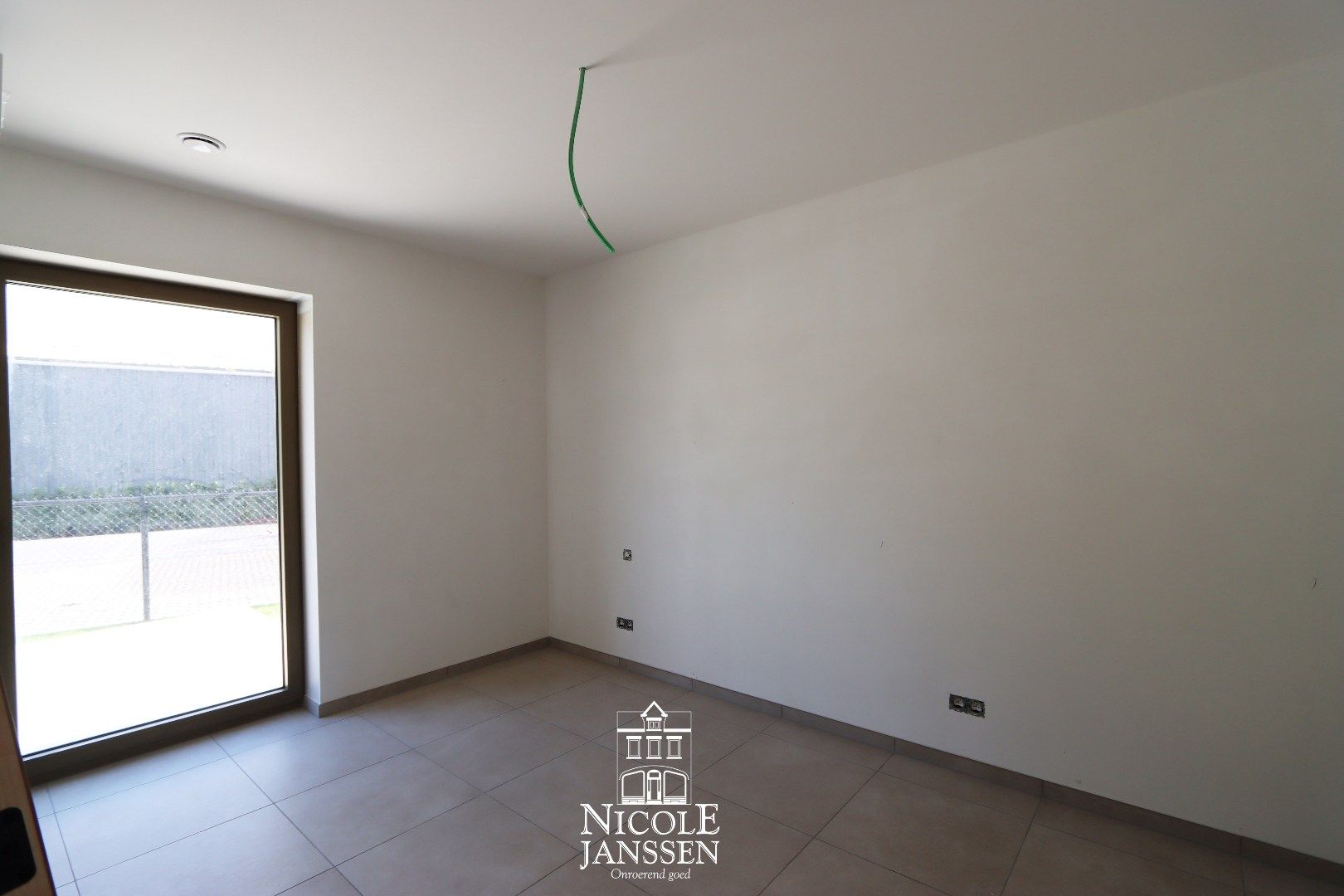 Gelijkvloers nieuwbouwappartement met tuintje en drie autostandplaatsen foto 7