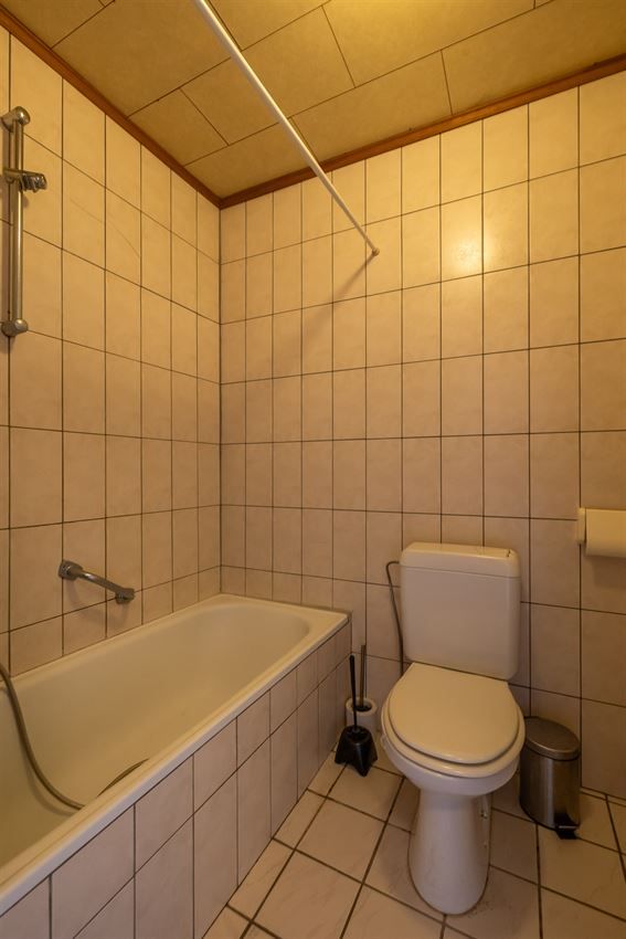 Verzorgd gebouw met handelszaak en 2 apt foto 35