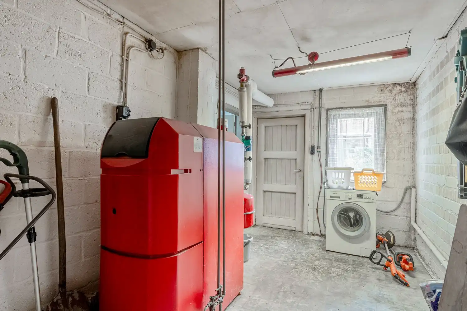 Zeer goed onderhouden en instapklare woning met drie slaapkamers, gezellige stadstuin en achter gelegen garage te Wijgmaal ! foto 21