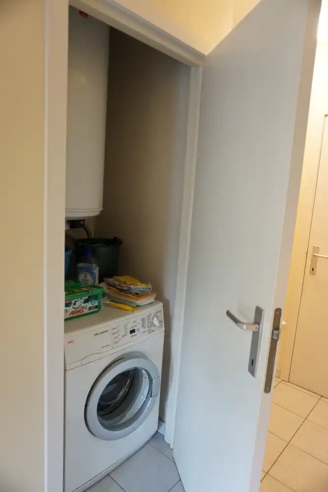 Instapklaar en rustig gelegen appartement met garagebox foto 11