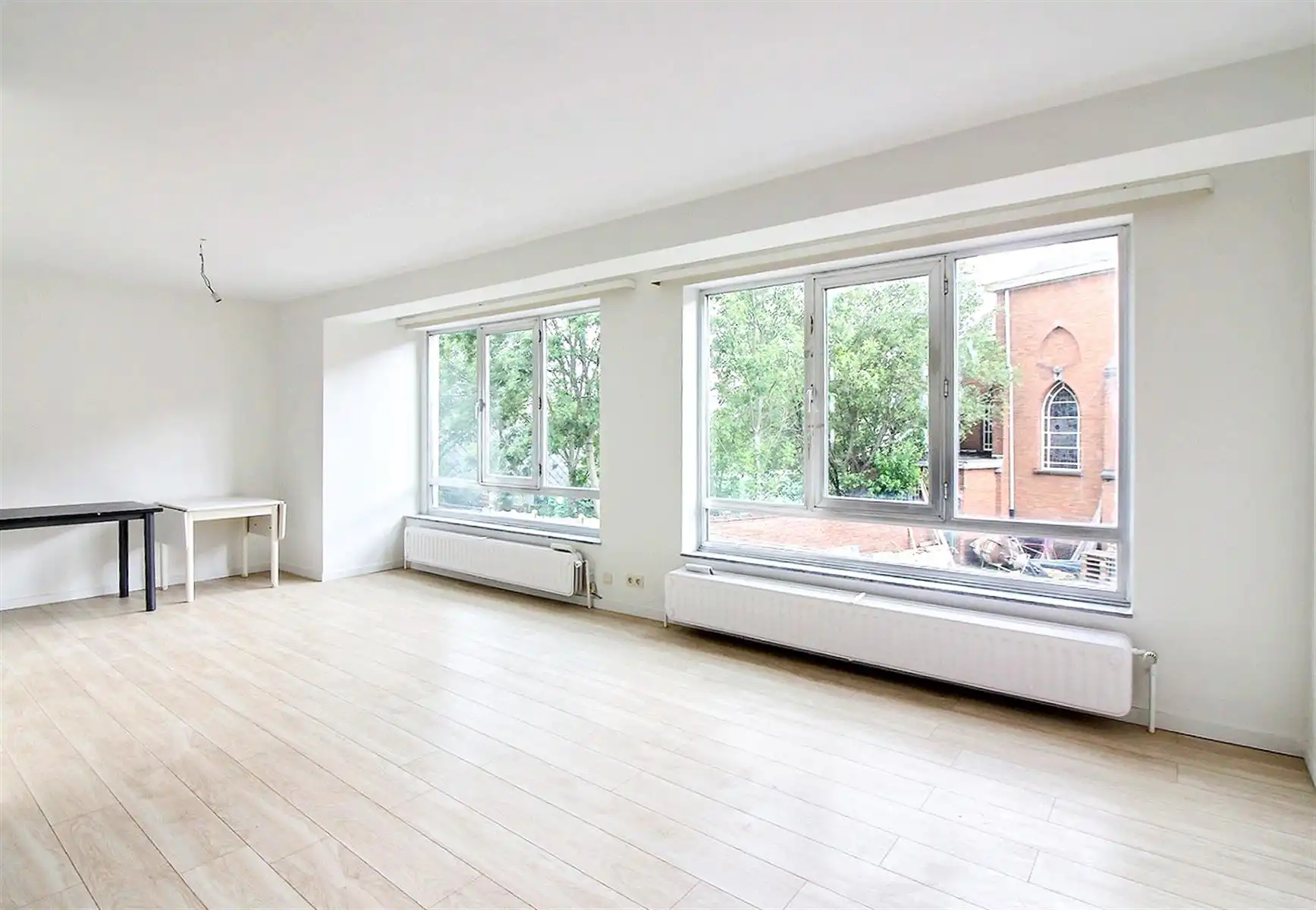 Lichtrijk éénslaapkamerappartement met terras in het centrum foto {{pictureIndex}}