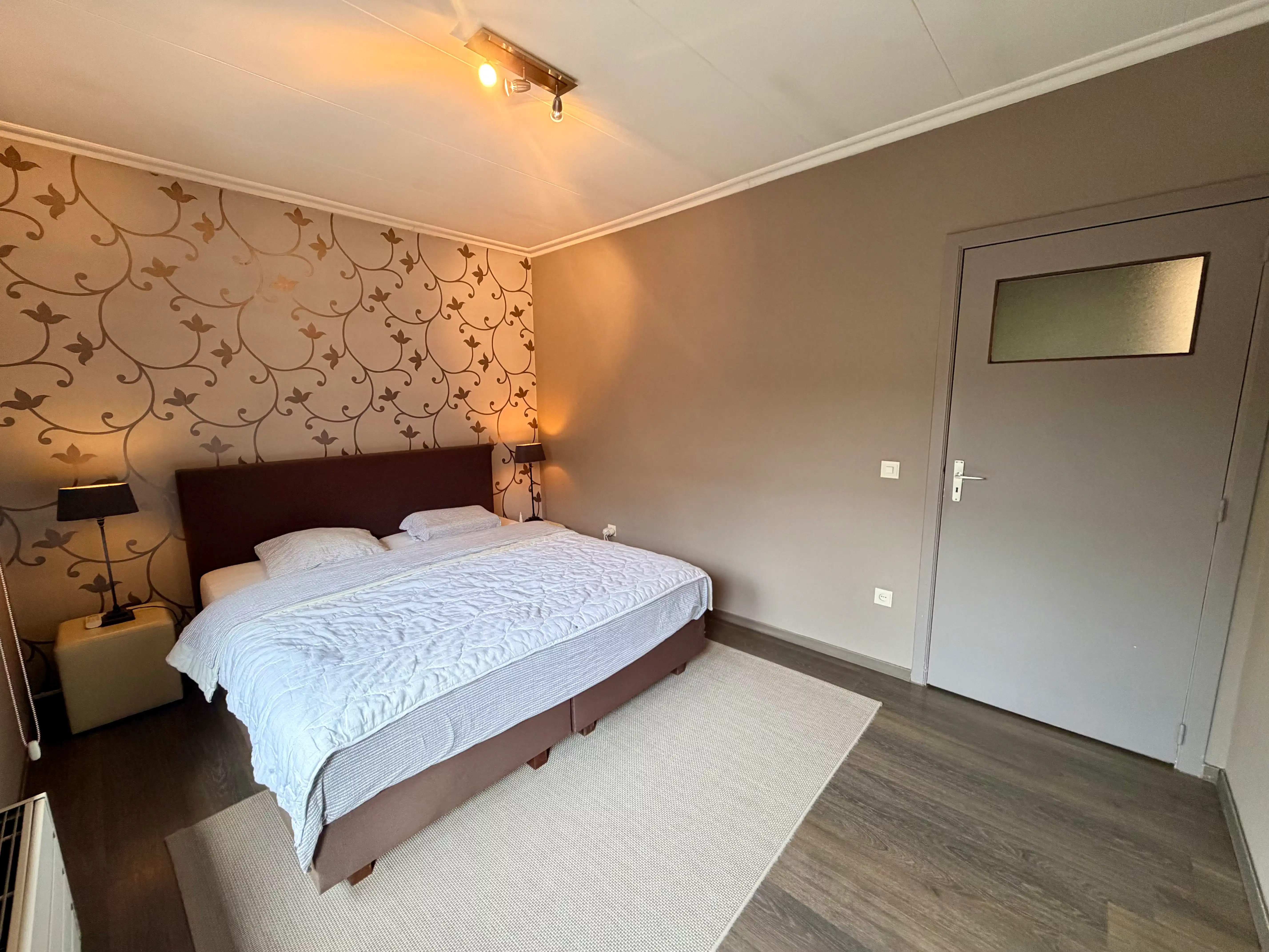 Genk, Westerwennel 25: Gelijkvloerse woning met 3 slaapkamers in een rustige woonwijk met een prachtig onderhouden tuin. foto 16