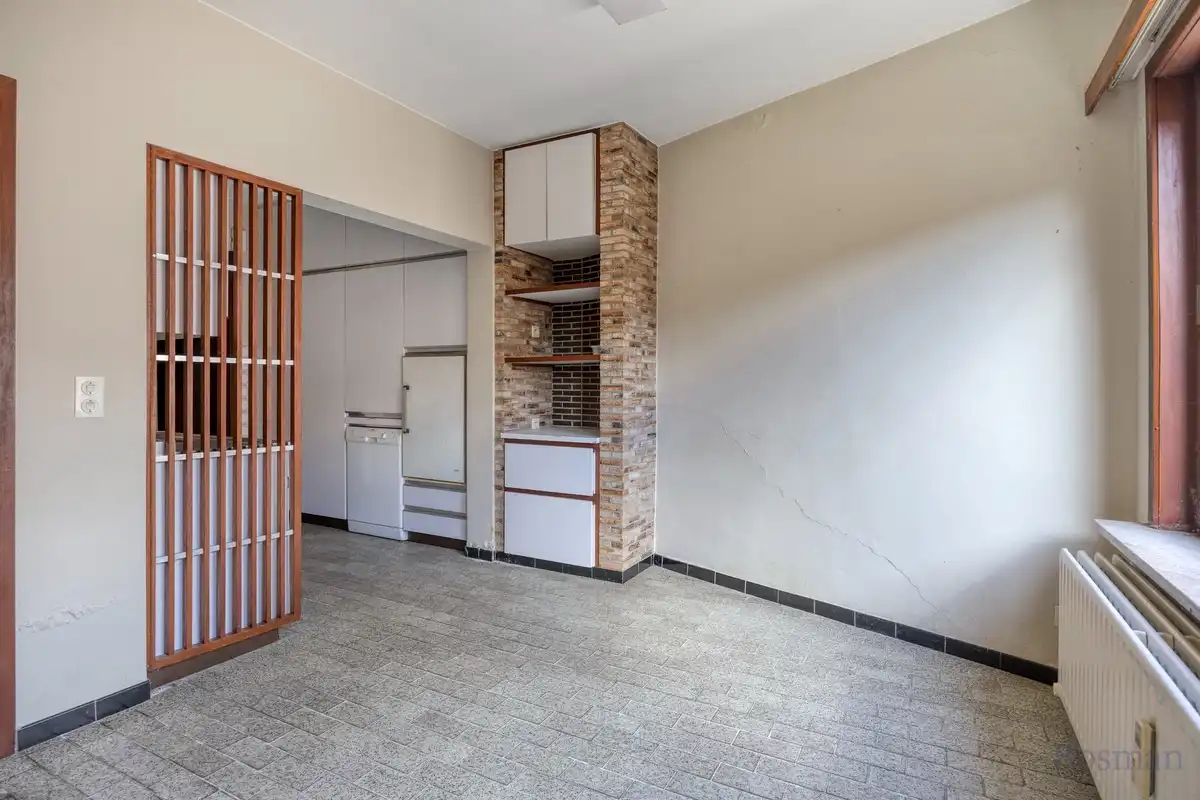 Te renoveren woning met 5 garageboxen te koop in Ham foto 7