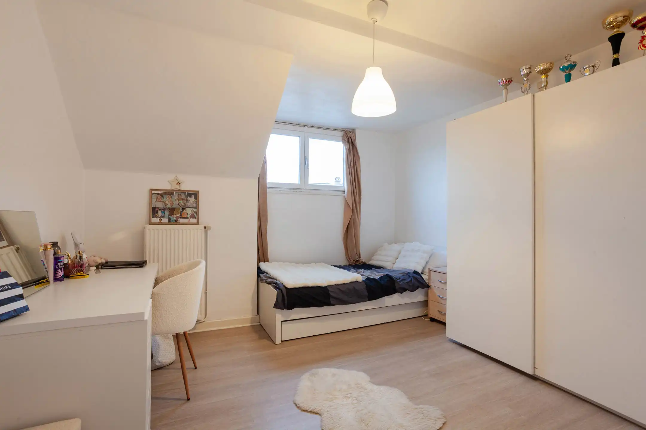 Opbrengsteigendom met handelsruimte en 2 grote appartementen foto 21