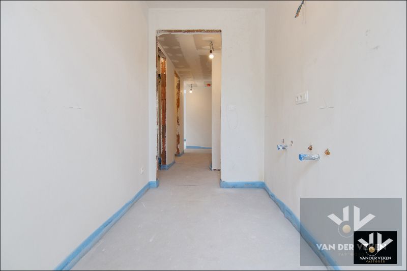 Ruim nieuwbouwappartement met 2 slaapkamers en riant terras op een goed bereikbare locatie! foto 7