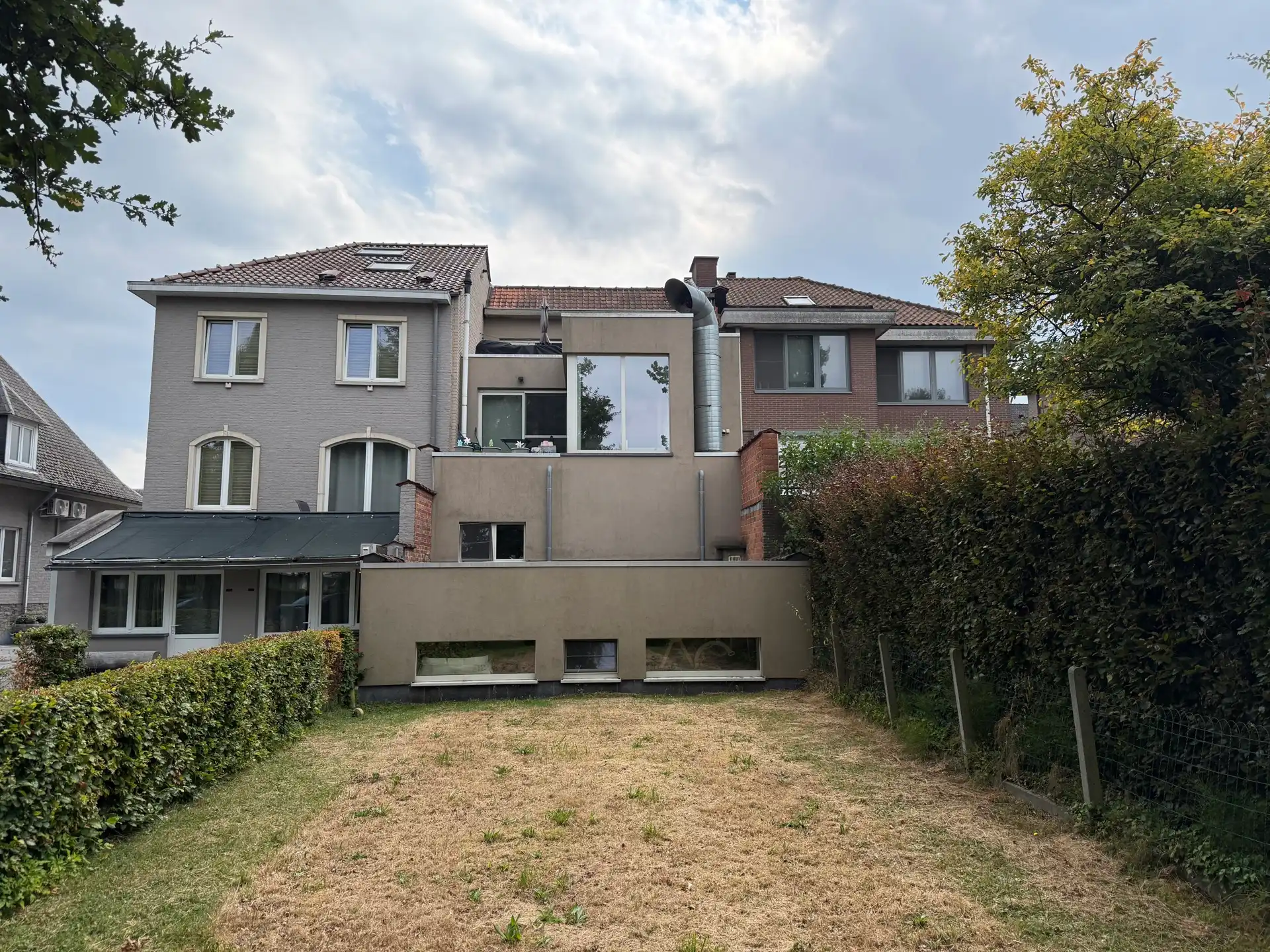 Duplex met 2 terrassen en tuin foto 12