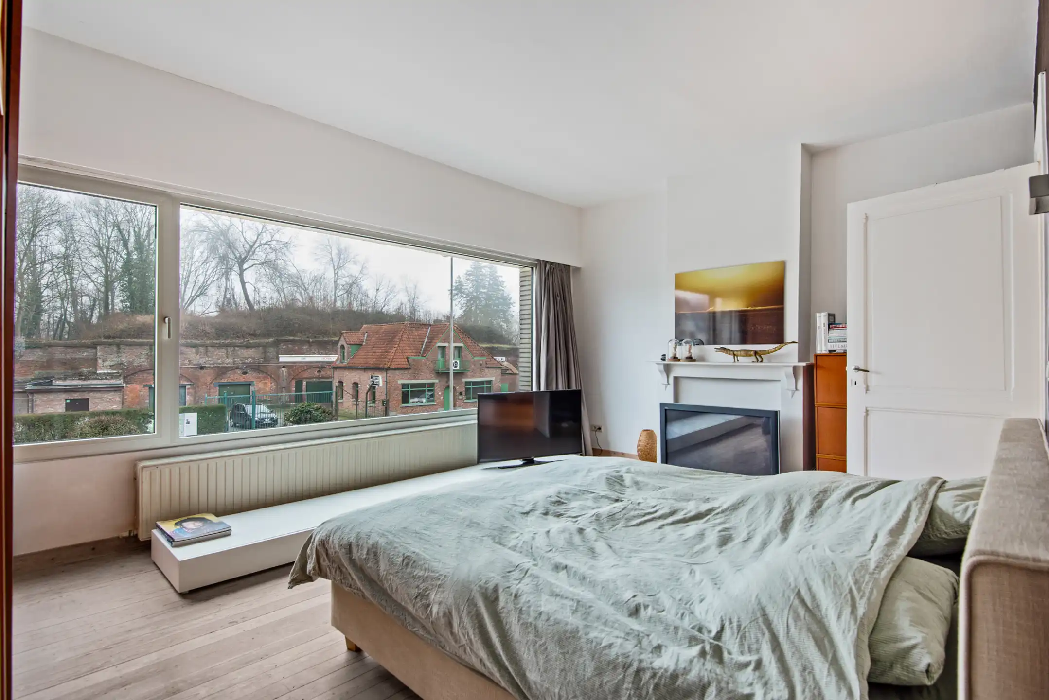 In het centrum gel. stadswoning met 5 slpk., terras, tuin en garage foto 29