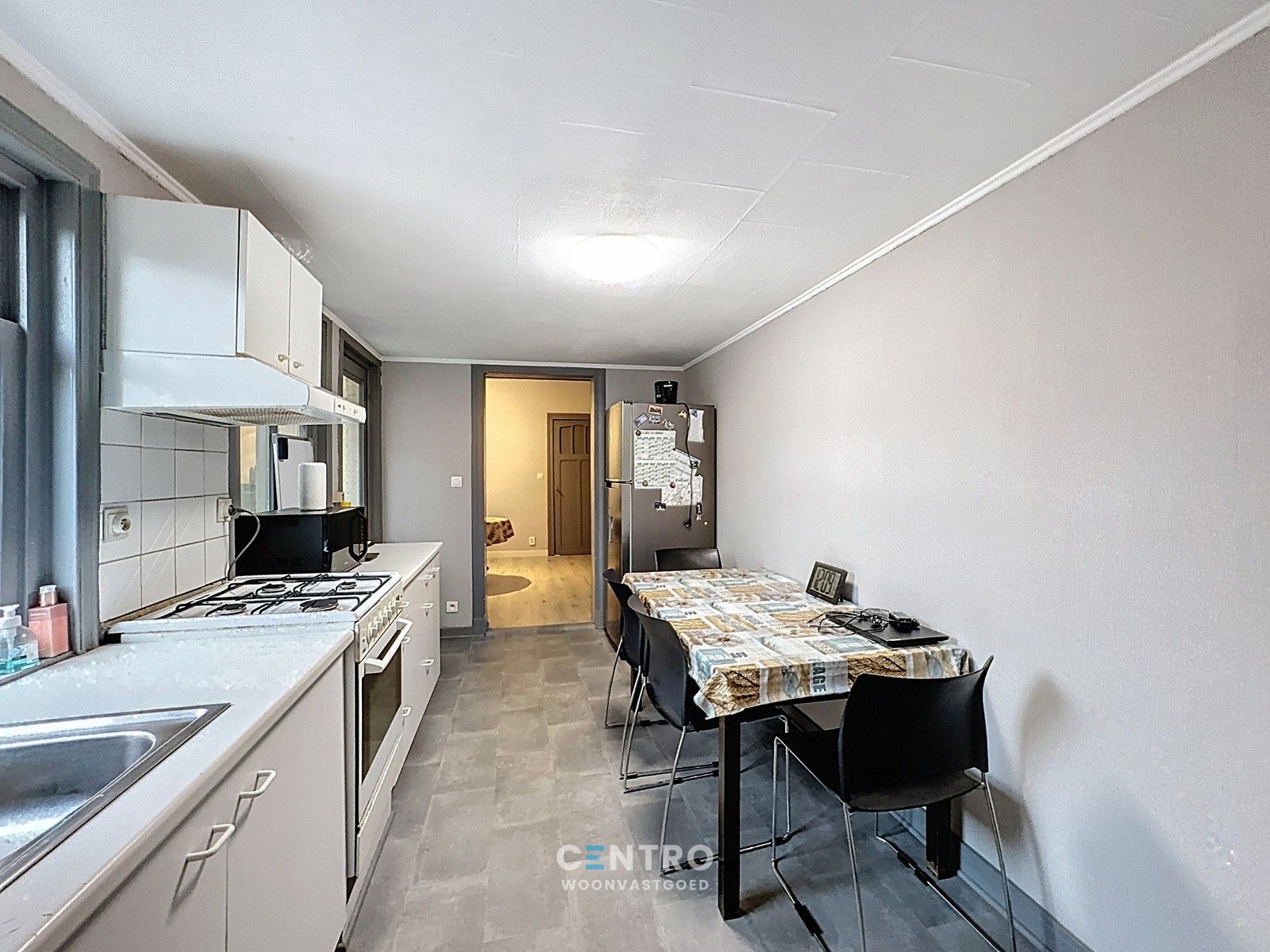 Op te frissen woning met 4 slpks én ZUIDger. tuin te Assebroek! foto 7