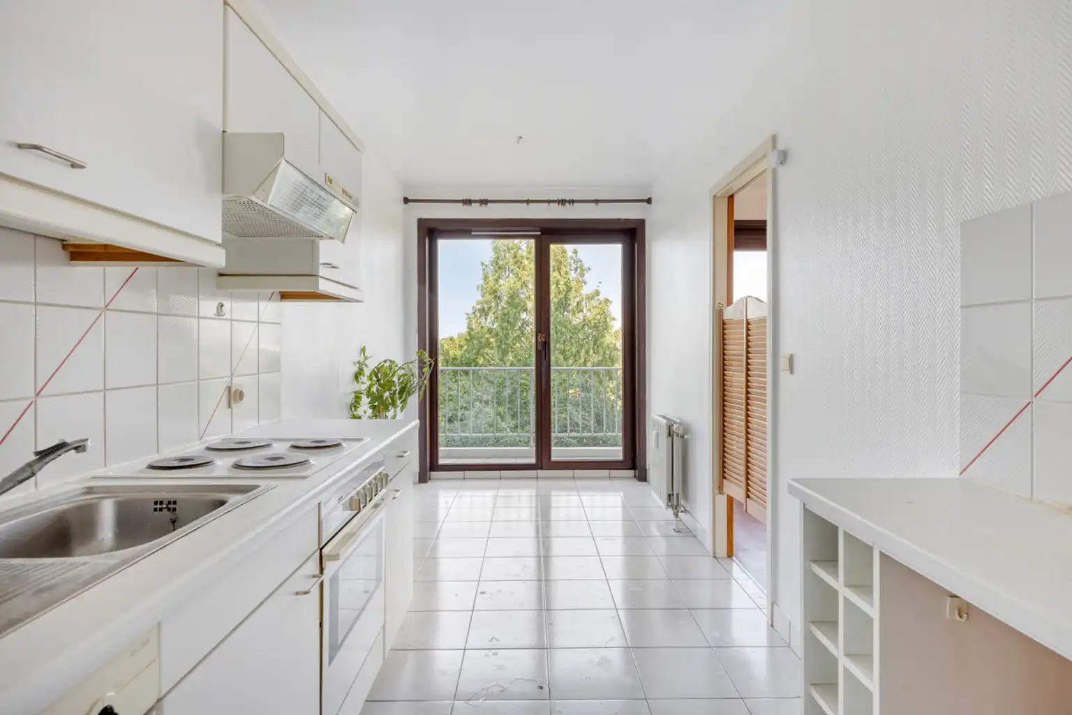 Ruim 3-slaapkamerappartement met garage op toplocatie foto 8