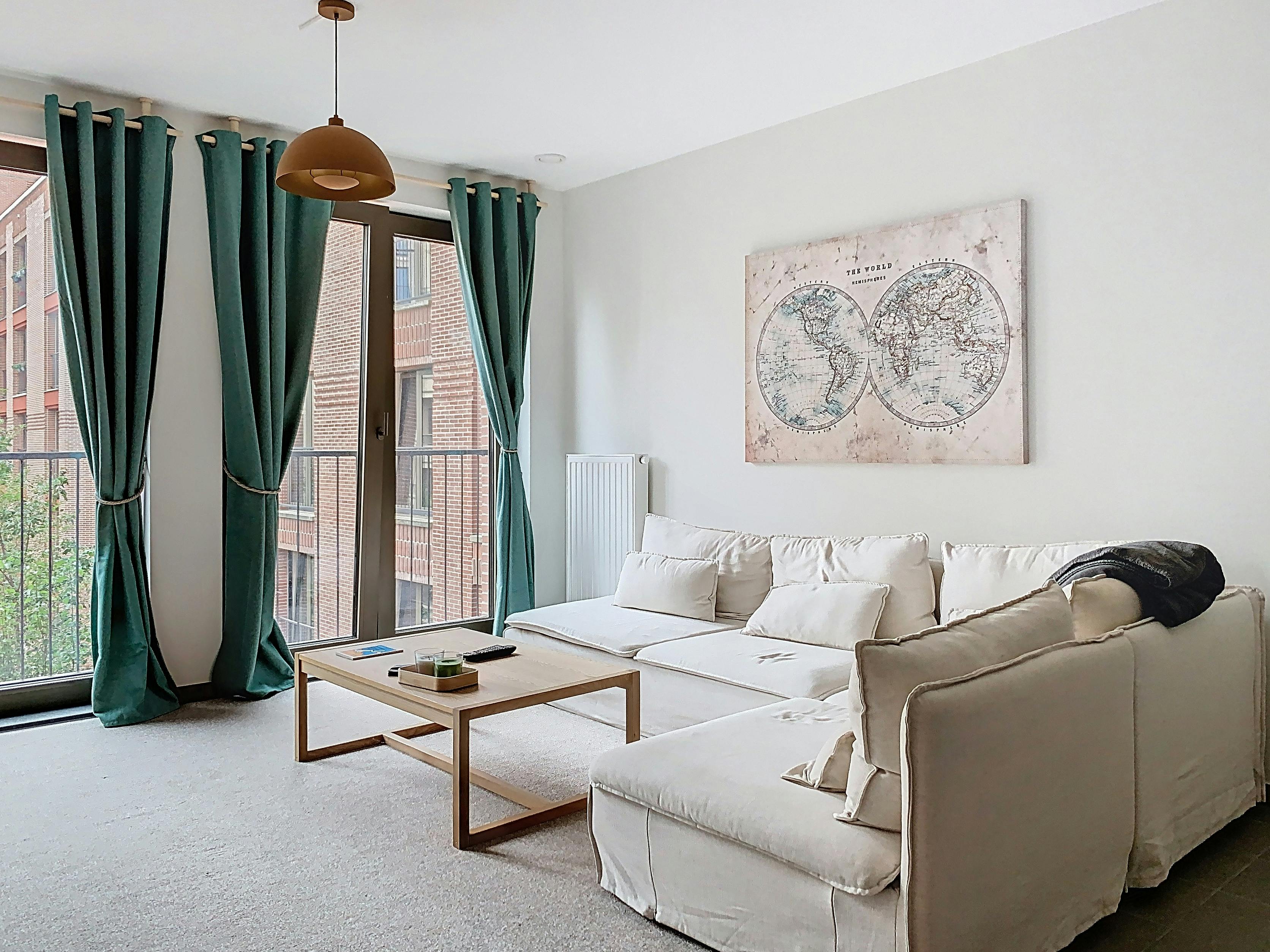 Tour & Taxis - Lichtijk 1-slaapkamerappartement te huur  foto {{pictureIndex}}