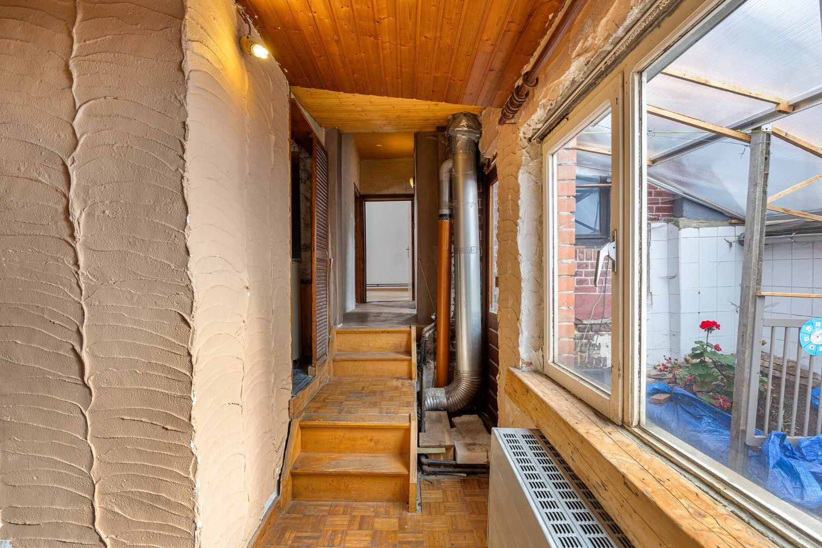 Halfopen hoekwoning met garage en dakterras op toplocatie in Kessel-Lo – renovatieproject met veel potentieel foto 21