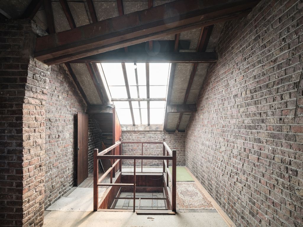 Op te frissen, karaktervolle art déco herenwoning naar de hand van architect J. Hebbelynck met aangename stadstuin met bijzonder veel potentieel. foto 23