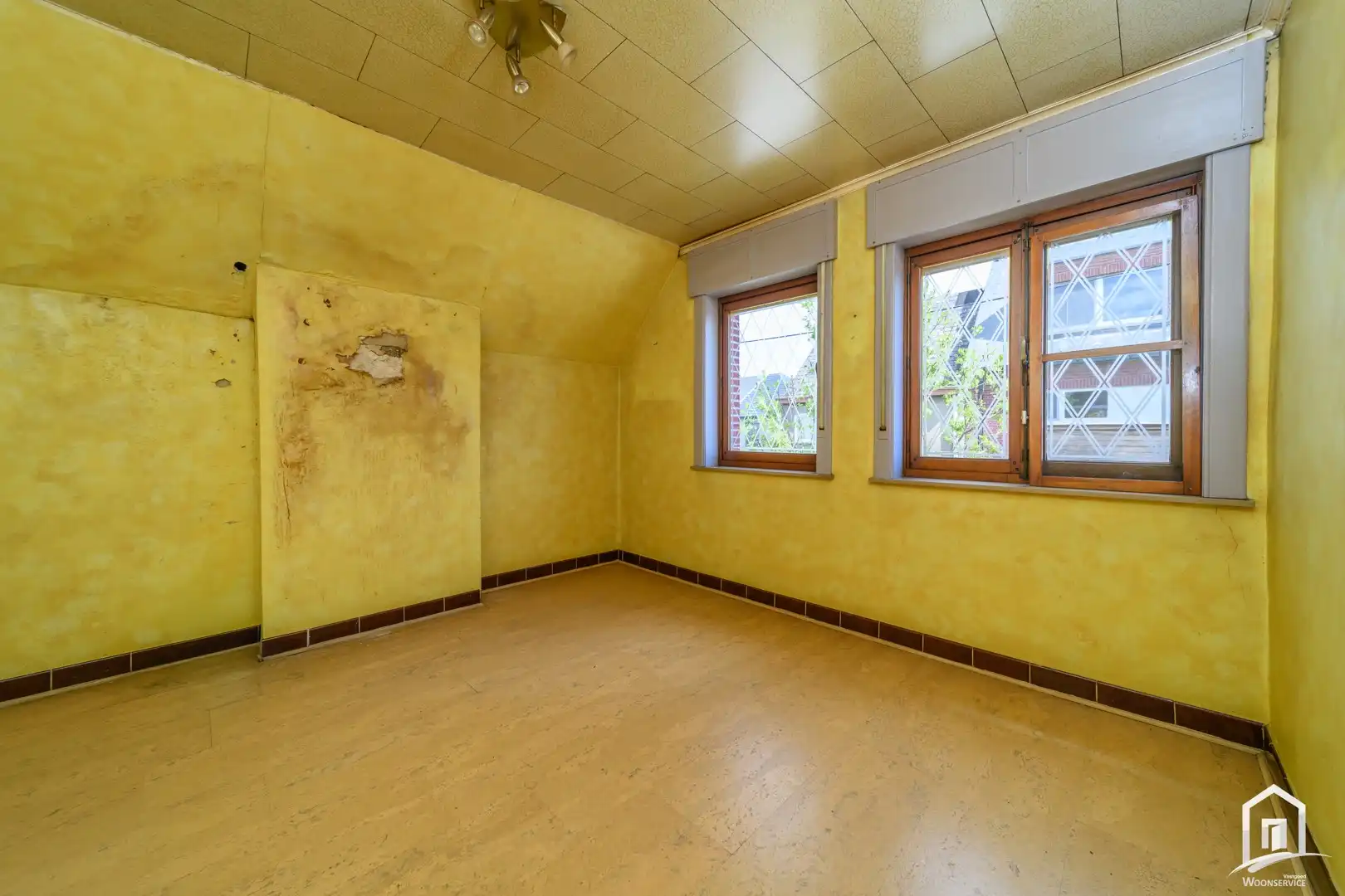 Te renoveren gezinswoning met 2 slaapkamers en ruime tuin foto 12