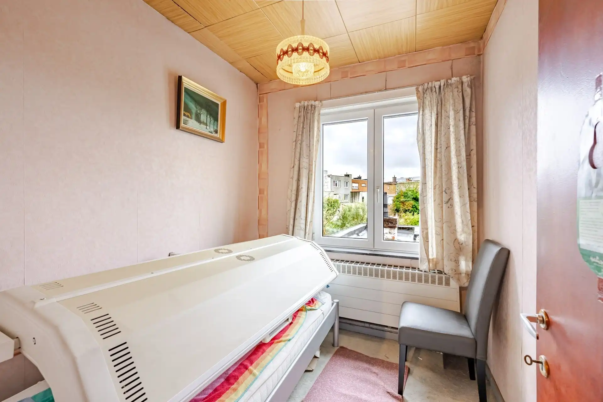 Rijwoning nabij het OLV-ziekenhuis met 3 slaapkamers en tuin foto 14