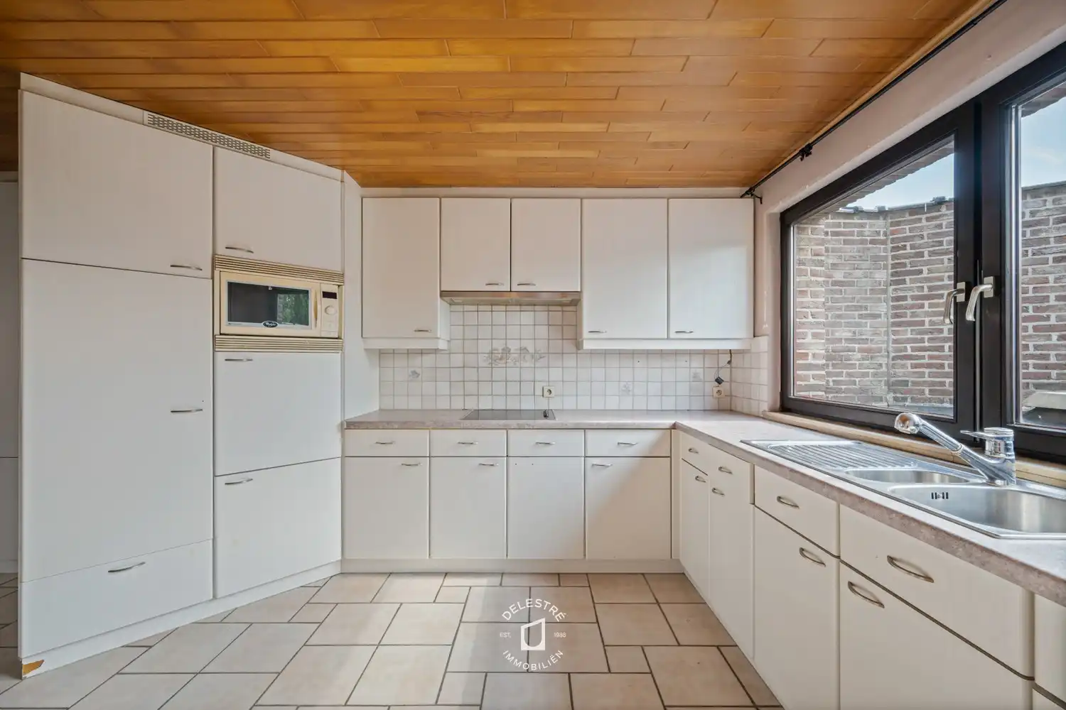 Uitzonderlijk ruime (handels) woning (300 m²) met atelier, dubbele garage en diepe tuin in Denderleeuw foto 12