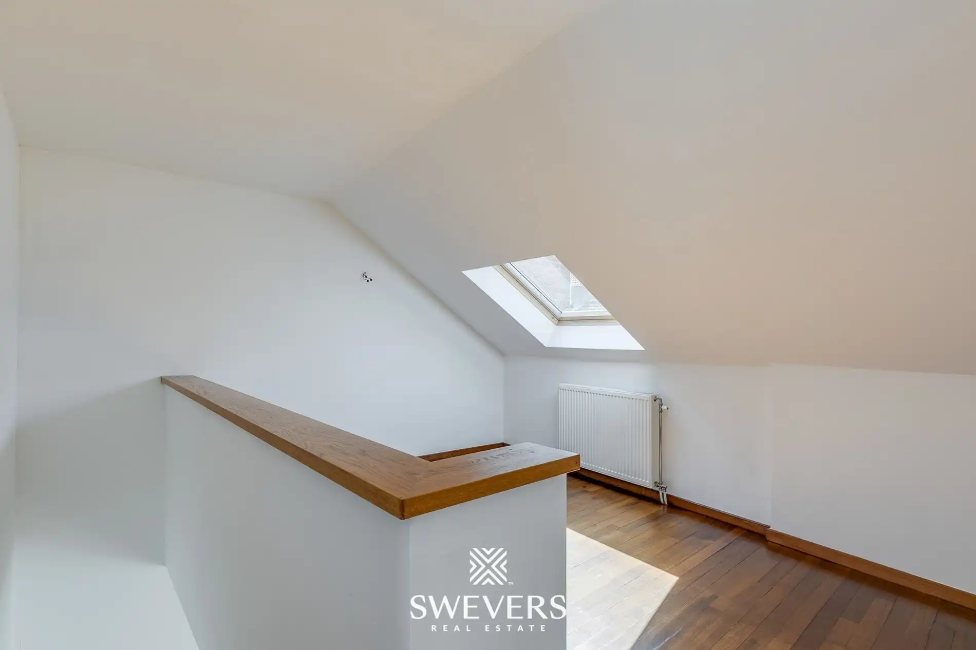 Ruim duplex-appartement in hartje Hasselt: ideaal voor 3 studenten of om te co-housen foto 9