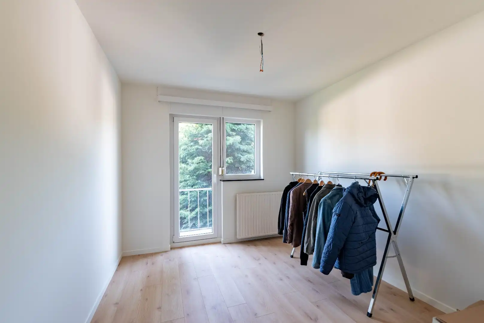 Vernieuwd appartement met 2 slaapkamers foto 7