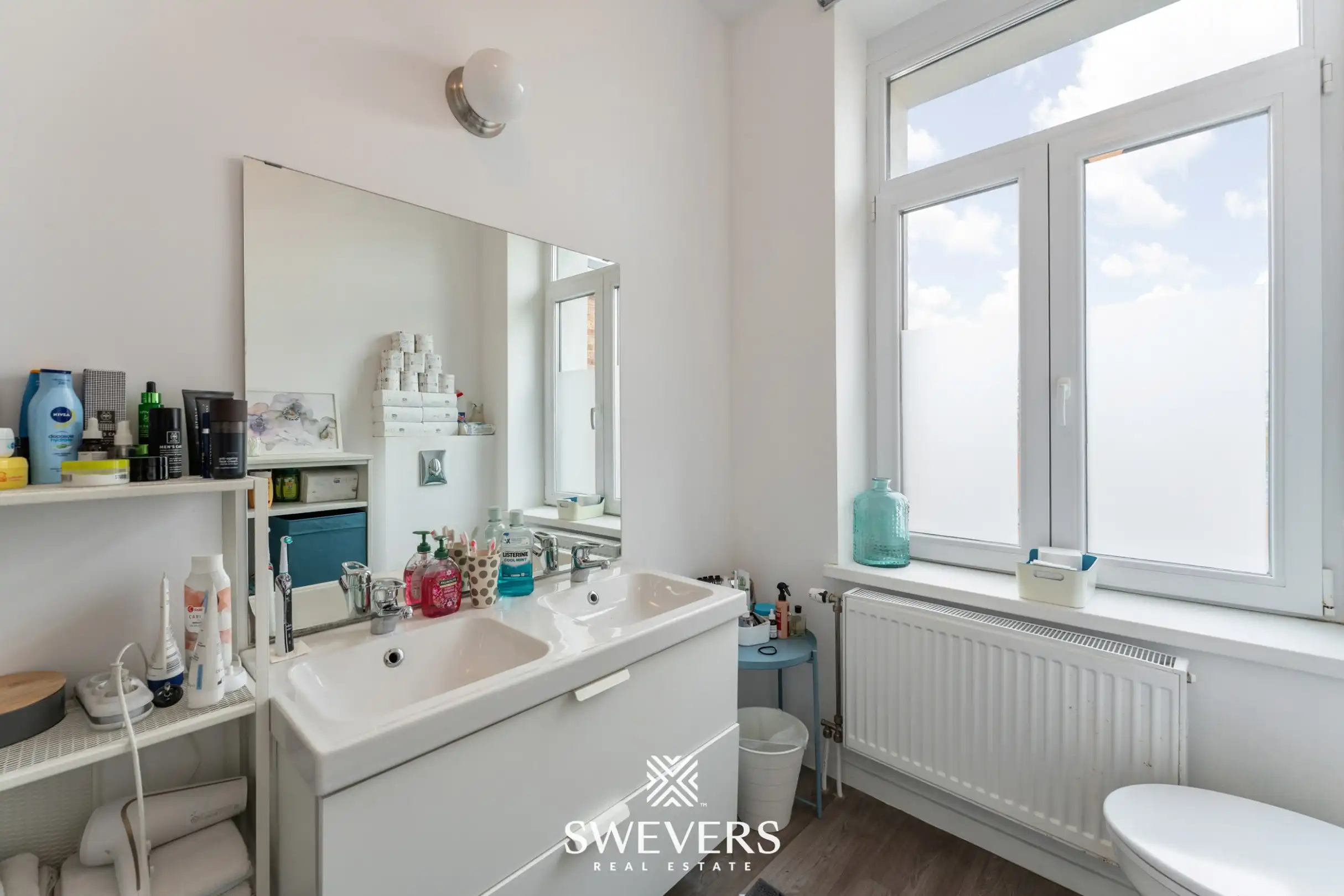 Instapklare stadswoning met zonnige tuin op toplocatie nabij centrum Leuven foto 14