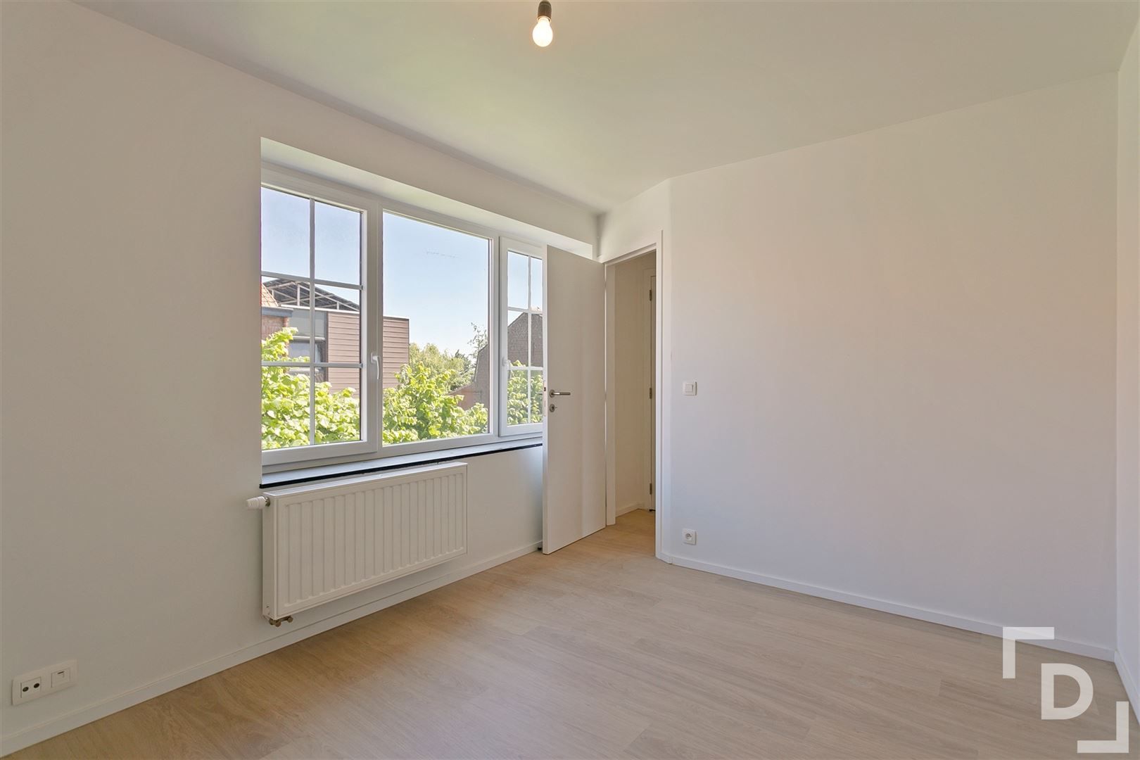 Instapklare rijwoning met uitgang achteraan foto 17