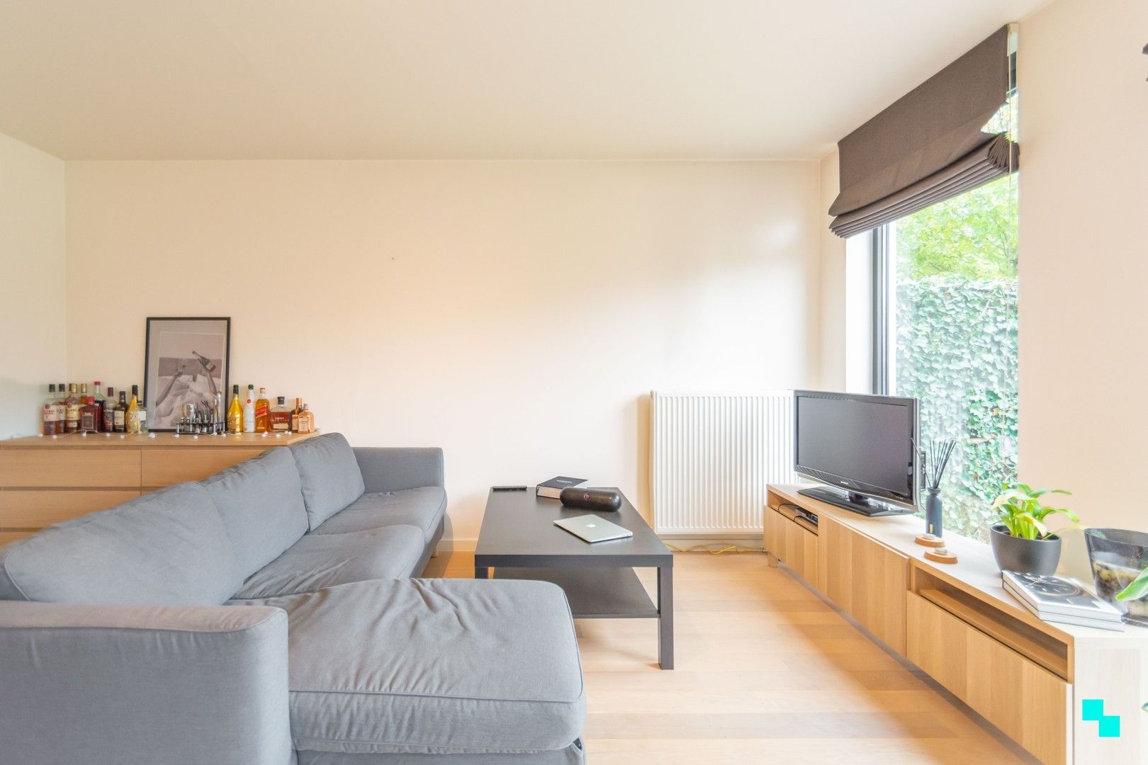 Ruim gelijkvloers appartement met tuin foto 8