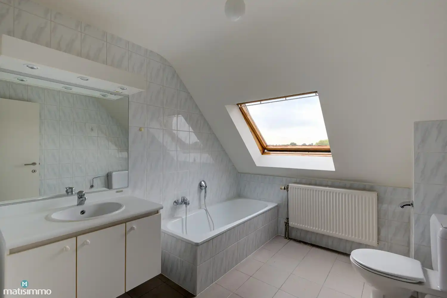 INSTAPKLAAR DUPLEXAPPARTEMENT MET 2 SLAAPKAMERS EN GARAGE NABIJ HET CENTRUM VAN BILZEN foto 10