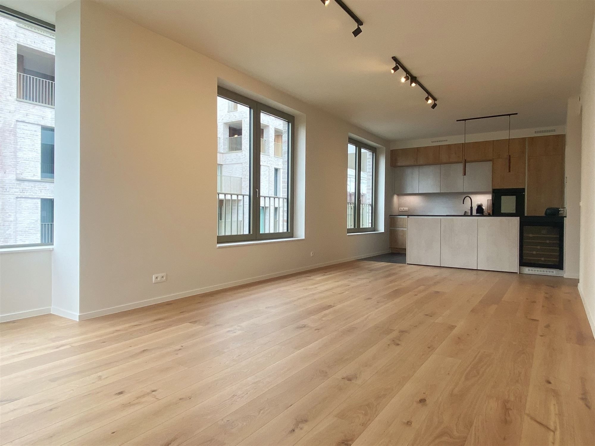 Nieuwbouw 2-Slaapkamerappartement te huur in Hartje Deinze foto 1