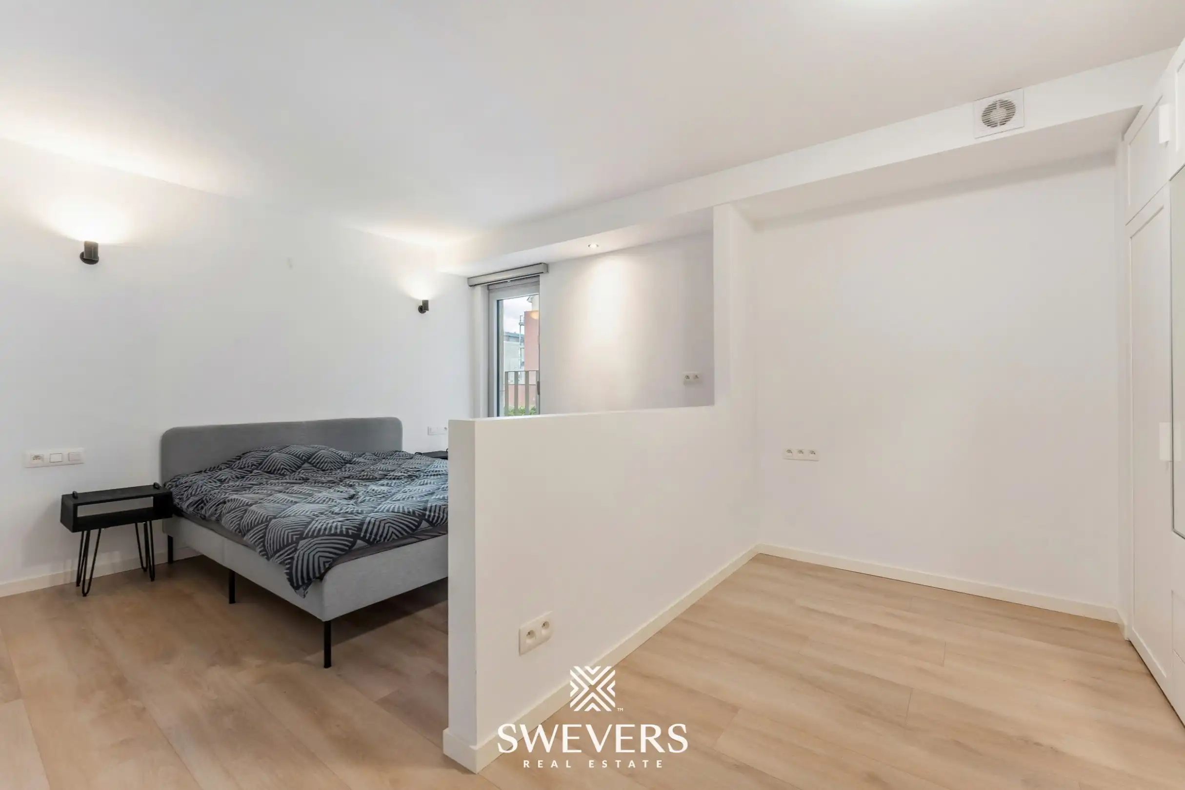 Modern en instapklaar appartement in hartje Genk met uitstekende investeringsopportuniteit foto 12