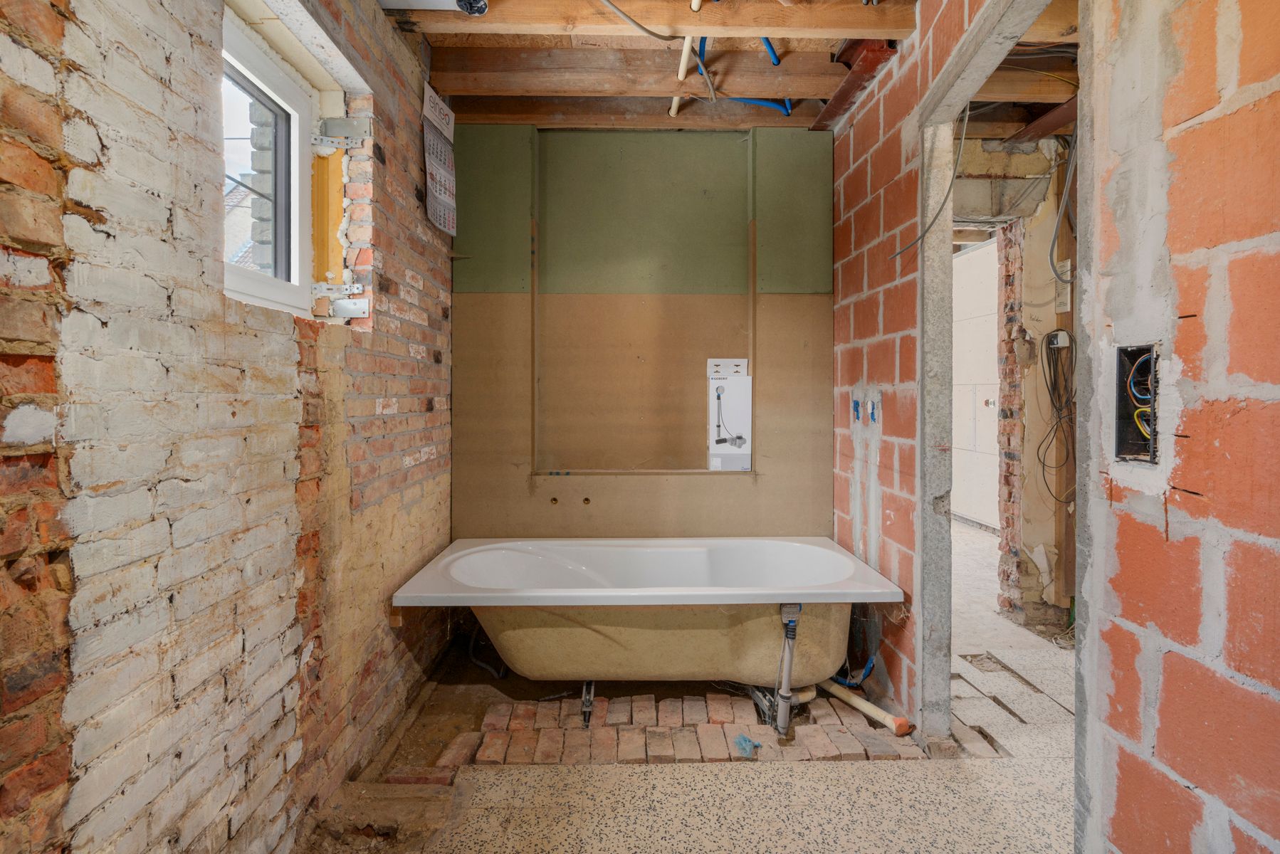 Verder te renoveren woning met drie slaapkamers te Smetlede! foto 7